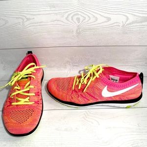 Pink and green Nike sneakers